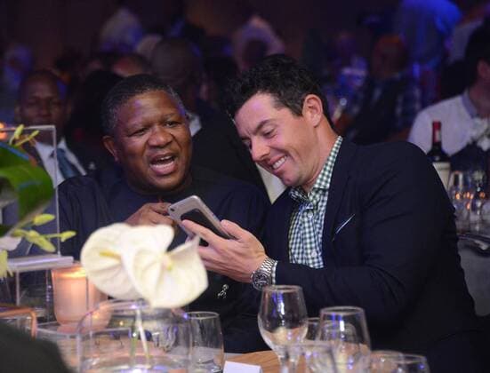 The 2017 BMW SA Open Championship gala dinner KEMPTON PARK, SOUTH AFRICA - JANUARY 10: and Recreation Minister Fikile Mbalula shares a moment with international golfer Rory McIlroy during the 2017 BMW SA Open Championship gala dinner at Emperors Palace on January 10, 2017 in Kempton Park, South Africa. The BMW SA Open hosted by City of Ekurhuleni, which starts on January 12, 2017 will be held at the picturesque Glendower Golf Club, with Rory McIlroy, Ernie Els, Brandon Stone and Andy Sullivan in the field. ( Gallo0108226