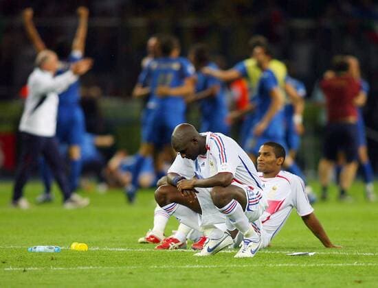 July 9, 2006 - Olympiastadion, BERLIN, GERMANY - Alou Diarra & Florent Malouda.as italy celebrate.ITALY V FRANCE..Alou Diarra & Florent Malouda.ITALY V FRANCE.OLYMPIC STADIUM, BERLIN GERMANY 07-09-2006.K48556. - PHOTOS ITALY VS FRANCE ALL - ZUMAg49_ 76421914st
