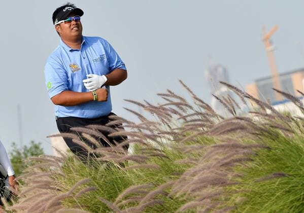 (170129) -- DOHA, Jan. 28, 2017 -- Kiradech Aphibarnrat of Thailand reacts during the third day match at Qatar Masters at the Doha Golf Club in Doha, capital of Qatar, on January 28, 2017. ) (SP)QATAR-DOHA-GOLF-QATAR MASTERS-DAY 3 Nikku 