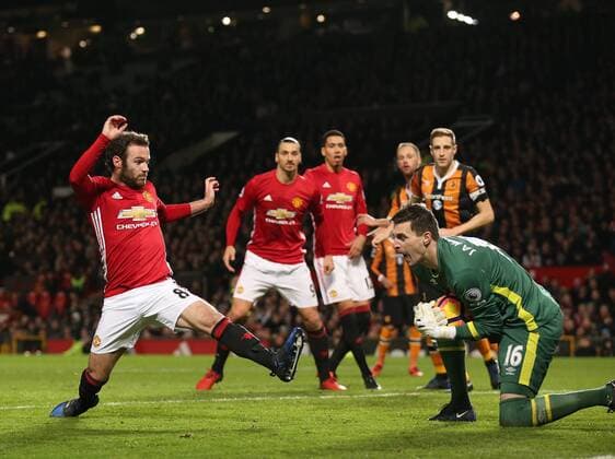 Juan Mata of Manchester United ManU in action with Eldin Jakupovic of Hull City during the English Premier League match at Old Trafford Stadium, Manchester. Picture date: February 1st, 2017. Pic Simon Bellis Sportimage EDITORIAL USE ONLY. No use with unauthorised audio, video, data, fixture lists, club league logos or live services. Online in-match use limited to 120 images, no video emulation. No use in betting, games or single club league player publications.