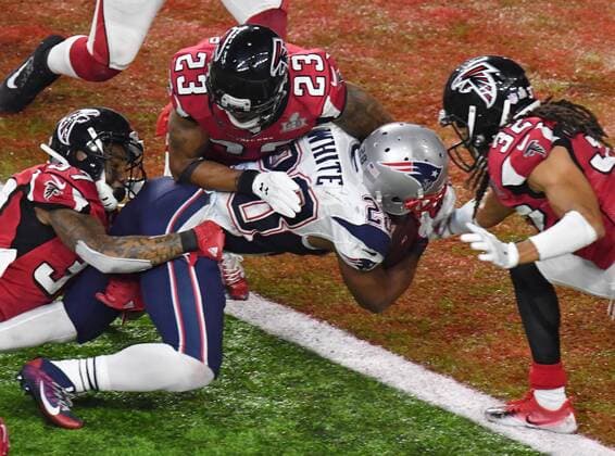 New England Patriots running back James White scores on a 2-yard run against the Atlanta Falcons to win Super Bowl LI at NRG Stadium in Houston, Texas on February 5, 2017. New England beat Atlanta 34-28 to win the NFL American Football Herren USA s first Super Bowl overtime game.  SBP2017020543 DAVIDxTULIS