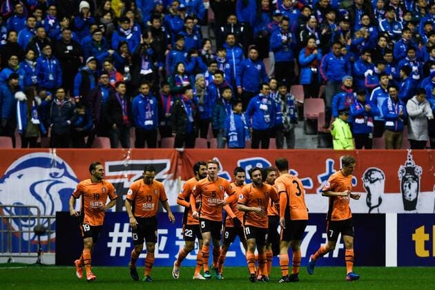 SHANGHAI, CHINA - FEBRUARY 08: Brandon Borrello 28 of Brisbane Roar celebrates with team mates after scoring his team s first goal during the AFC Champions League 2017 play-off match between Shanghai Shenhua and Brisbane Roar at Hongkou Stadium on February 8, 2017 in Shanghai, China.  Copyright: xVCGx CFP499553054 