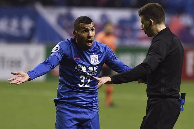SHANGHAI, CHINA - FEBRUARY 08: Carlos Tevez 32 of Shanghai Shenhua argues with the referee Valentin Kovalenko during the AFC Champions League 2017 play-off match between Shanghai Shenhua and Brisbane Roar at Hongkou Stadium on February 8, 2017 in Shanghai, China.  Copyright: xVCGx CFP499557503 