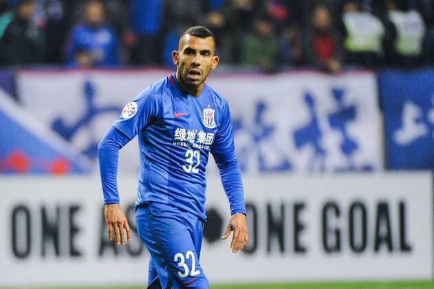 Argentine football player Carlos Tevez of China s Shanghai Greenland Shenhua F.C. reacts after missing a goal against Australia s Brisbane Roar F.C. in a qualifying match during the 2017 AFC Champions League in Shanghai, China, 8 February 2017. Carlos Tevez s debut for big-spending Chinese Super League side Shanghai Shenhua did not go as planned. In fact, it was the exact opposite as they were unceremoniously dumped out of the Asian Champions League play-off by Brisbane Road. Tevez, who moved to China from Boca Juniors for a reported ¡ê615,000-a-week and became the world s highest-paid player , couldn t help his new team-mates as they went down 2-0 in one of the biggest shocks the AFC has seen. Carlos Tevez has nightmare debut for Shanghai Shenhua as they are dumped out of AFC Champions League  20170208_65740