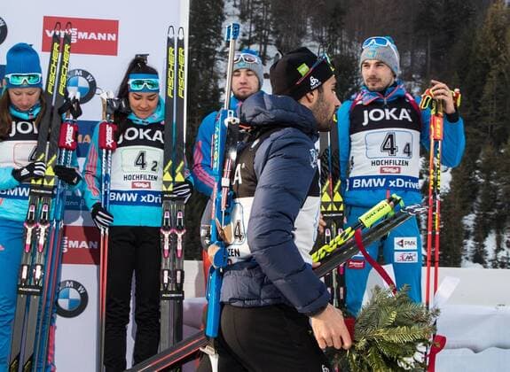 HOCHFILZEN, AUSTRIA - FEBRUARY 9, 2017: Bronze medalists Olga Podchufarova, Tatyana Akimova, Alexander Loginov, Anton Shipulin of Russia (L-R back), and silver medalist Martin Fourcade of France (front) at an award ceremony for the 2 6 km + 2 7.5 km Mixed Relay event at the 2017 IBU Biathlon World Championships in Hochfilzen, Austria. Stanislav Krasilnikov TASS  TS040857