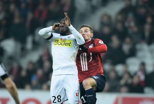 Issa Cissokho ( Angers ) - Eric Bautheac ( Lille ) FOOTBALL : Lille OSC vs SCO Angers - Ligue 1 - Lille - 11 02 2017 FedericoPestellini Panoramic 