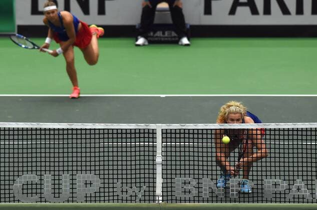 The double team of the Czech Republic with Lucie Safarova (left) and Katerina Siniakova (right) in action during the tennis match of the Fed Cup 1st round between the Czech Republic and Spain (Sara Sorribes, Maria Jose Martinez), in Ostrava, Czech Republic, February 12, 2017. (CTKxPhoto JaroslavxOzana) CTKPhotoP201702120771801  jao 17
