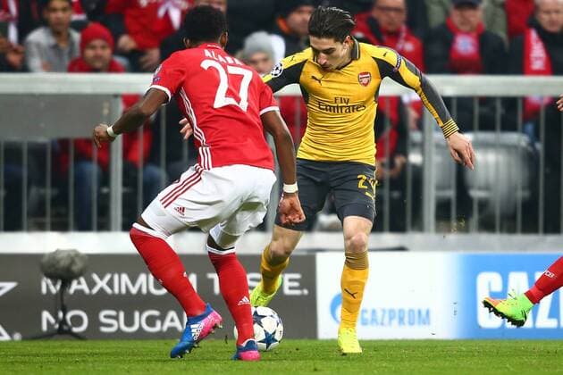 SOCCER - CL, Bayern vs Arsenal MUNICH,GERMANY,15.FEB.17 - SOCCER - UEFA Champions League, FC Bayern Muenchen vs FC Arsenal. Image shows Hector Bellerin (Arsenal) and David Alaba (Bayern). GEPAxpictures xFelixxRoittner