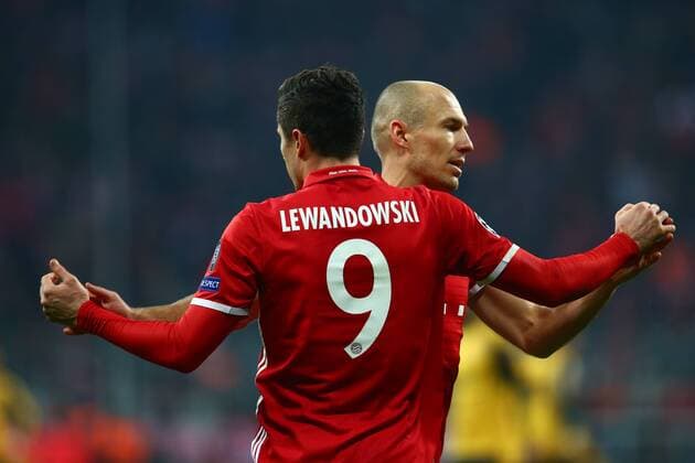SOCCER - CL, Bayern vs Arsenal MUNICH,GERMANY,15.FEB.17 - SOCCER - UEFA Champions League, FC Bayern Muenchen vs FC Arsenal. Image shows the rejoicing of Robert Lewandowski and Arjen Robben (Bayern). GEPAxpictures xFelixxRoittner