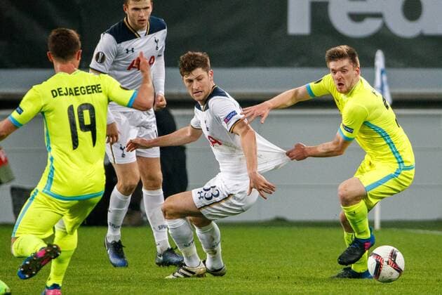 Tottenham s defender Ben Davies and Gent s Thomas Foket fight for the ball during a game between Belgian soccer team KAA Gent and British team Tottenham, first-leg of the 1 16 finals of the Europa League competition, Thursday 16 February 2017, in Gent. KURTxDESPLENTER  x05048747x
