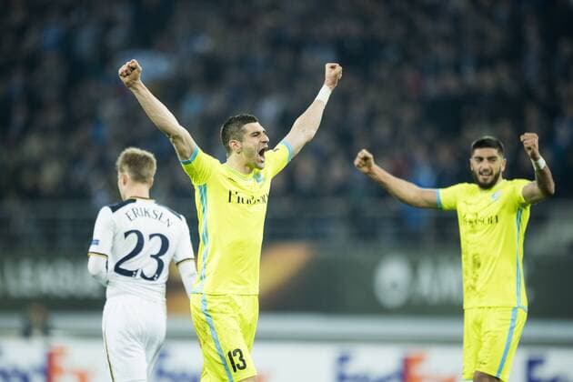 Gent s Stefan Mitrovic and Gent s Samuel Gigot celebrate after winning a game between Belgian soccer team KAA Gent and British team Tottenham, first-leg of the 1 16 finals of the Europa League competition, Thursday 16 February 2017, in Gent. JASPERxJACOBS  x05048930x