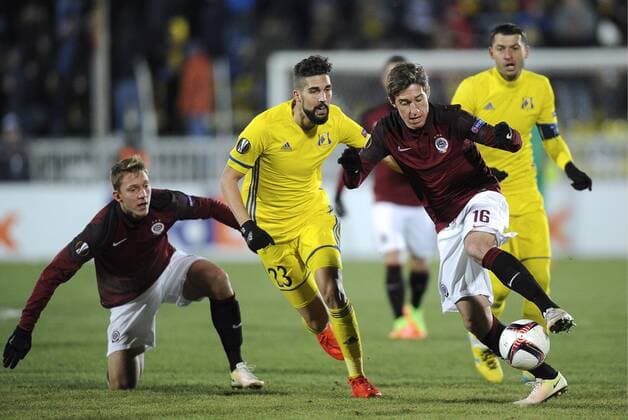 ROSTOV-ON-DON, RUSSIA - FEBRUARY 16, 2017: FC Rostovâ€™s Miha Mevlja and AC Sparta Pragueâ€™s Michal Sacek (L-R in the middle) fight for the ball in their 2016-17 UEFA Europa League Round of 32, 1st leg football match at Olimp 2 Staduim. FC Rostov won the game 4-0. Valery Matytsin TASS  TS04176F