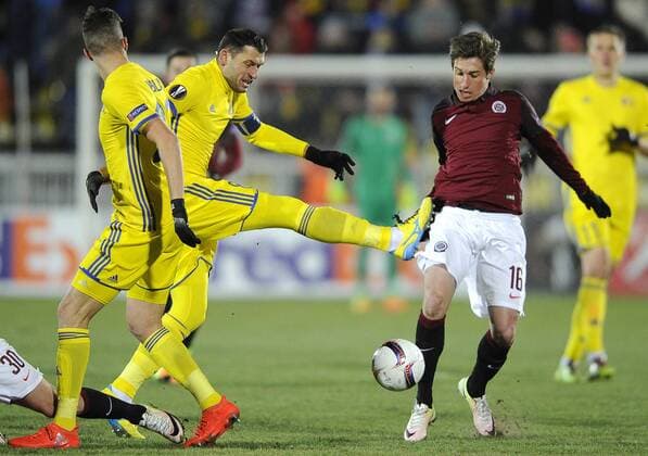 ROSTOV-ON-DON, RUSSIA - FEBRUARY 16, 2017: FC Rostovâ€™s Miha Mevlja, Alexandru Gatcan, and AC Sparta Pragueâ€™s Michal Sacek (L-R) in their 2016-17 UEFA Europa League Round of 32, 1st leg football match at Olimp 2 Stadium. FC Rostov won the game 4-0. Valery Matytsin TASS  TS041785