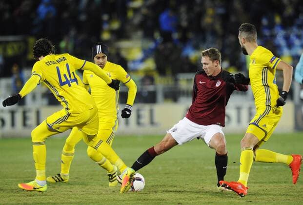 ROSTOV-ON-DON, RUSSIA - FEBRUARY 16, 2017: FC Rostovâ€™s Cesar Navas, Christian Noboa, AC Sparta Pragueâ€™s Lukas Julis, and FC Rostovâ€™s Alexandru Gatcan (L-R) fight for the ball in their 2016-17 UEFA Europa League Round of 32, 1st leg football match at Olimp 2 Stadium. FC Rostov won the game 4-0. Valery Matytsin TASS  TS04178D