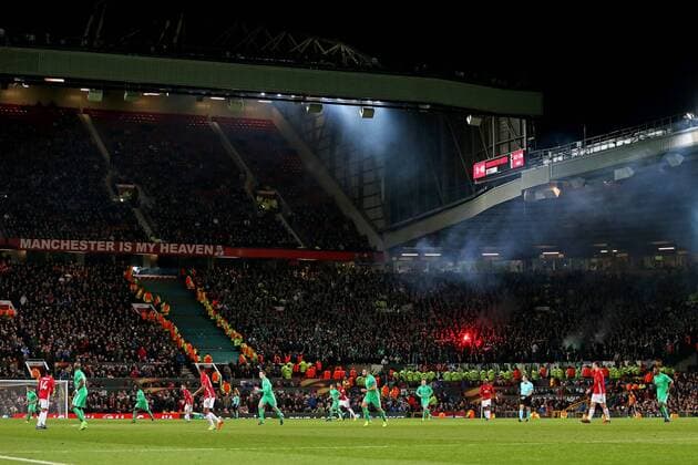 A general view as Saint-Etienne fans let off a flare during the UEFA Europa League Round of 32 1st leg match at Old Trafford Stadium, Manchester. Picture date: February 16th, 2017. Pic credit should read: Matt McNulty Sportimage EDITORIAL USE ONLY. No use with unauthorised audio, video, data, fixture lists, club league logos or live services. Online in-match use limited to 120 images, no video emulation. No use in betting, games or single club league player publications.