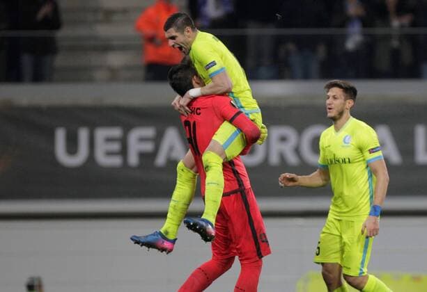 February 16th 2017, Ghent, Belgium; UEFA Europa League Round of 32 First Leg between KAA Gent and Tottenham Hotspur; Goal celebration as goalkeeper Kalinic hugs a team mate in the 59th minute for 1-0 xlaurent.lairysx  ActionPlus11846893