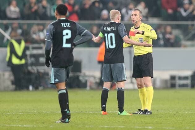 February 16th 2017, sports, Polish Army Stadium, Warsaw, Poland; Referee David Fernandez Borbolan, Kenny Tete (Ajax), Davy Klaassen (Ajax) at the Legia Warsaw versus Ajax Amsterdam, UEFA Europa League tie xTomaszxJastrzebowskix  ActionPlus11847022