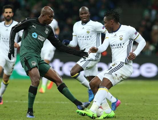KRASNODAR, RUSSIA - FEBRUARY 16, 2017: FC Krasnodar s Charles Kabore (L) and Fenerbahce Istanbulâ€™s Jeremain Lens fight for the ball in their 2016-17 UEFA Europa League Round of 32, 1st leg football match at Krasnodar Stadium. FC Krasnodar won the game 1-0. Vitaly Timkiv TASS  TS041788