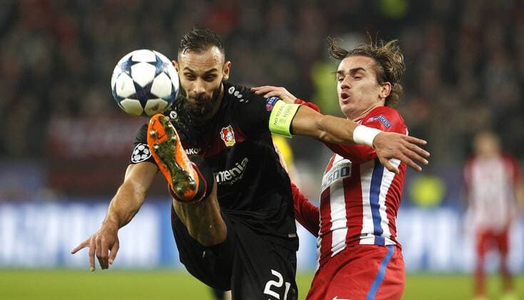 Oemer Toprak (Bayer 04 Leverkusen) (L) challenges Antoine Griezmann (Atletico Madrid) during the Championsleague match between Bayer 04 Leverkusen and Atletico Madrid, Bayarena in Leverkusen on February 21., 2017. Bayer 04 Leverkusen vs. Atletico Madrid im Achtelfinale der Champions League der Saison 2016 2017 am 21. Februar 2017.