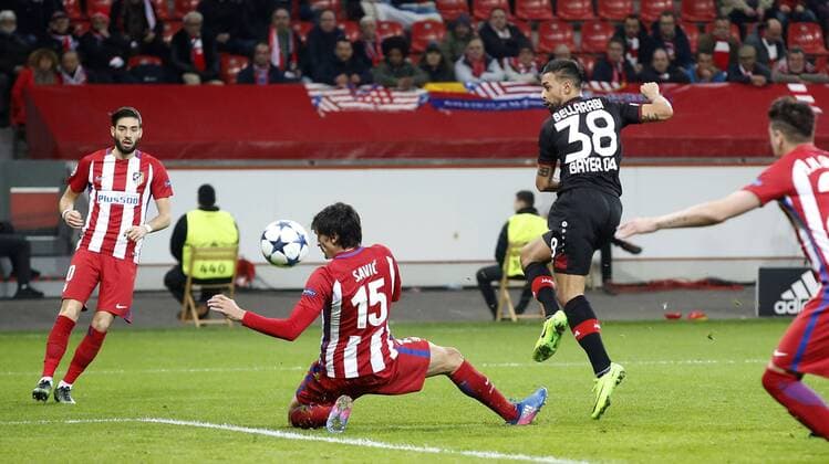Karim Bellarabi (Bayer 04 Leverkusen) (R) scores the 1:2 goal against Stefan Savic (Atletico Madrid) during the Championsleague match between Bayer 04 Leverkusen and Atletico Madrid, Bayarena in Leverkusen on February 21., 2017. Bayer 04 Leverkusen vs. Atletico Madrid im Achtelfinale der Champions League der Saison 2016 2017 am 21. Februar 2017.