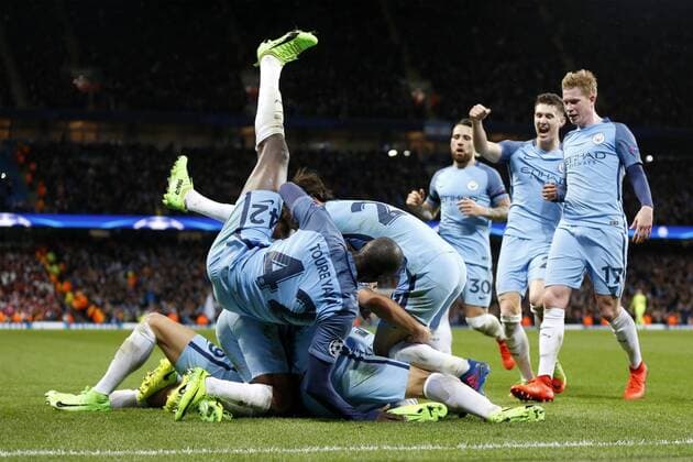 Football - 2016 2017 UEFA Champions League - Round of Sixteen, First Leg: Manchester City vs. Monaco Leroy Sane of Manchester City celebrates scoring during the match at the Etihad Stadium. COLORSPORT 
