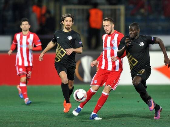 Osmanlispor s Tiago Pinto, Badou Ndiaye (10) and Olympiakos s Kostas Fortunis (7) vie for the ball during the UEFA European League football match, between Osmanlispor and Olympiakos at Osmanli Stadyumu in Ankara, February 23, 2017. (  Copyright: HikmetxSaatci 15634838