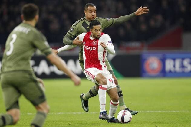 (L-R) Tomasz Jodlowiec of Legia Warszawa, Vadis Odjidja of Legia Warszawa, Jairo Riedewald of Ajaxduring the UEFA Europa League round of 16 match between Ajax Amsterdam and Legia Warsaw at the Amsterdam Arena on February 23, 2017 in Amsterdam, The Netherlands Ajax v Legia Warschau UEFA Europa League 2016 2017 xVIxxIVx 7183794
