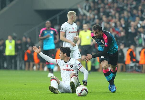 UEFA Europa League match between Besiktas and Hapoel Beer Sheva at Vodafone Arena in Istanbul , Turkey on February 23, 2017. Pictured: Necip Uysal of Besiktas and Vladimir Broun of Hapoel Beer Sheva. 