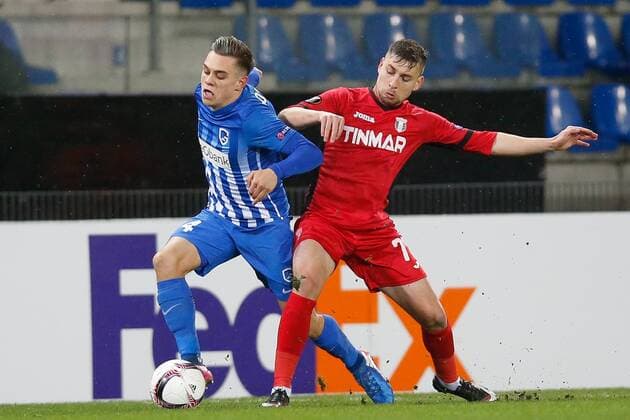 Genk s Leandro Trossard and Astra Giurgiu s Alexandru Stan fight for the ball during a game between Belgian soccer team RC Genk and Romanian Club Astra Giurgiu, return leg of the 1 16 finals of the Europa League competition Thursday 23 February 2017, in Genk. First leg result was 2-2. BRUNOxFAHY  x05053429x