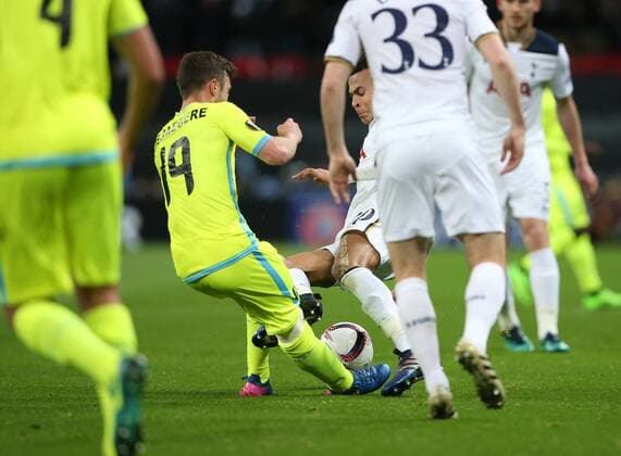 Tottenham s Dele Alli gets sent off for this tackle on Gent s Brecht Dejaegers during the Europa League Round of 32 Cup match at the Wembley Stadium, London. Picture date February 23rd, 2017 Pic David Klein Sportimage EDITORIAL USE ONLY. No use with unauthorised audio, video, data, fixture lists, club league logos or live services. Online in-match use limited to 120 images, no video emulation. No use in betting, games or single club league player publications.