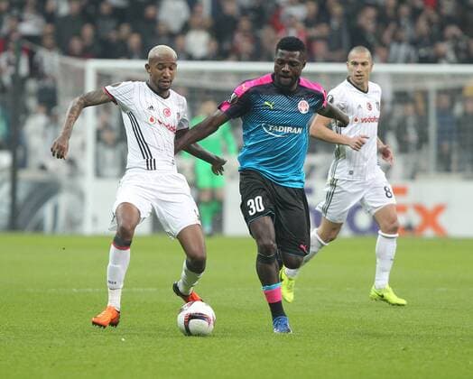 UEFA Europa League match between Besiktas and Hapoel Beer Sheva at Vodafone Arena in Istanbul , Turkey on February 23, 2017. Final Score : Besiktas 2 - Hapoel Beer Sheva 1 Pictured: Anderson Talisca (L) of Besiktas and John Ogu (R) of Hapoel Beer Sheva. 