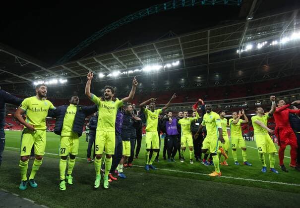 Gent s players celebrate at the final whistle during the Europa League Round of 32 Cup match at the Wembley Stadium, London. Picture date February 23rd, 2017 Pic David Klein Sportimage EDITORIAL USE ONLY. No use with unauthorised audio, video, data, fixture lists, club league logos or live services. Online in-match use limited to 120 images, no video emulation. No use in betting, games or single club league player publications.