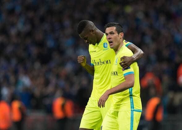 JŽrŽmy Perbet of KAA Gent celebrates scoring with Kalifa Coulibaly of KAA Gent during the UEFA Europa League Round of 32 Game 2 match between Tottenham Hotspur and Gent at Wembley Stadium, London, England on 23 February 2017. Copyright: xVincexxMignottx 14290036