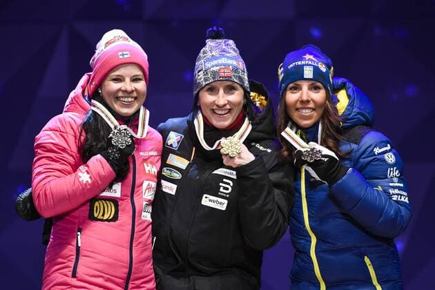 170225 Krista Parmakoski, Finland, Marit Björgen, (NOR), och Charlotte Kalla, (SWE), pa prispallen jublar vid - Siegerehrung - Nordische SKI WM in Lahti.  Copyright: CARLxSANDIN BB170225CS170