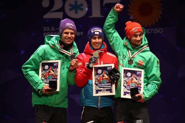 NORDIC SKIING - FIS WC Lahti 2017 LAHTI,FINLAND,26.FEB.17 - NORDIC SKIING, Ski jumping Skispringen Ski nordisch - FIS Nordic World Ski Championships, normal hill, men, award ceremony. Image shows Andreas Wellinger (GER), Stefan Kraft (AUT) and Markus Eisenbichler (GER). Keywords: medal. GEPAxpictures xCh.xKelemen