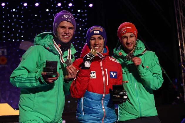 NORDIC SKIING - FIS WC Lahti 2017 LAHTI,FINLAND,26.FEB.17 - NORDIC SKIING, Ski jumping Skispringen Ski nordisch - FIS Nordic World Ski Championships, normal hill, men, award ceremony. Image shows Andreas Wellinger (GER), Stefan Kraft (AUT) and Markus Eisenbichler (GER). Keywords: medal. GEPAxpictures xCh.xKelemen