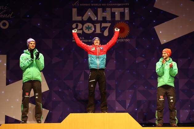 NORDIC SKIING - FIS WC Lahti 2017 LAHTI,FINLAND,26.FEB.17 - NORDIC SKIING, Ski jumping Skispringen Ski nordisch - FIS Nordic World Ski Championships, normal hill, men, award ceremony. Image shows Andreas Wellinger (GER), Stefan Kraft (AUT) and Markus Eisenbichler (GER). GEPAxpictures xCh.xKelemen