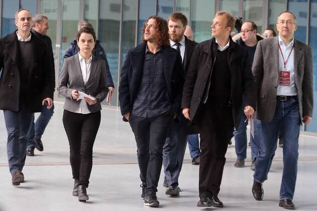 ST PETERSBURG, RUSSIA - FEBRUARY 27, 2017: Spanish retired football player Carles Puyol and FIFA Director of Competitions Colin Smith (L-R center) visit Zenit Arena Stadium. The FIFA inspection committee is satisfied with the stadium s readiness to host 2017 FIFA Confederations Cup and 2018 FIFA World Cup WM Weltmeisterschaft Fussball matches. Alexander Demianchuk TASS  TS042C14