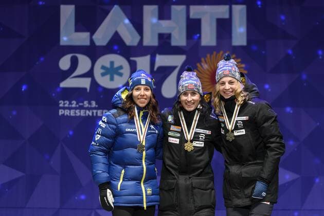 Ski Nordisch, WM in Lahti, Siegerehrung 10km Langlauf der Damen am Abend Charlotte Kalla, Sverige, Marit Björgen, Norge und Astrid Uhrenholdt Jacobsen, Norge 10km klassisch Lahti.  Copyright: CARLxSANDIN BB170228CS184