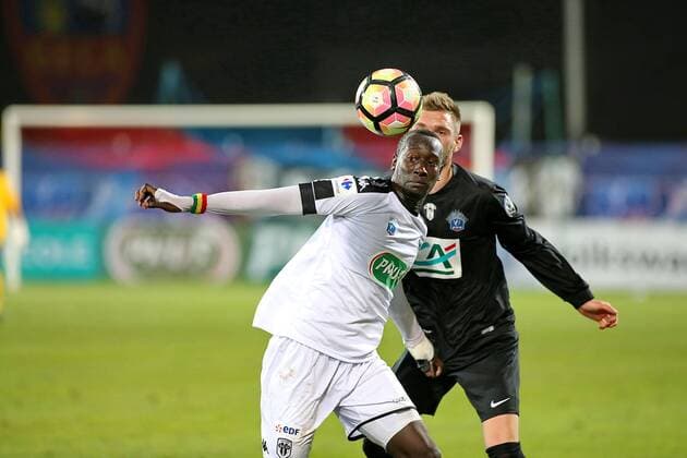 Nicolas Pepe (CA Bastia) vs Maxime Josse (SCO Angers) FOOTBALL : CA Bastia vs SCO Angers - 1 8eme de finale coupe de France - 28 02 2017 GerardPierlovisi Panoramic 
