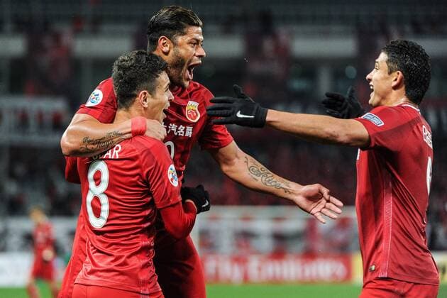 Brazilian football players Oscar, left, Elkeson, right, and Givanildo Vieira de Sousa, back, better known as Hulk, of China s Shanghai SIPG celebrate after scoring a goal against Australia s Western Sydney Wanderers FC in a Group G match during the 2017 AFC Champions League in Shanghai, China, 28 February 2017. Brazil striker Hulk put in an incredible performance ¡ª scoring the opener two minutes after kick-off and had a hand in three other goals ¡ª as Shanghai SIPG romped to a 5-1 victory over Western Sydney Wanderers in their AFC Champions League match in Shanghai Tuesday (28 February 2017) night. The victory allowed Andre Villas-Boas¡¯ team to go joint top of Group F on six points alongside Urawa Red Diamonds which beat FC Seoul 5-2 in an earlier match. Incredible Hulk fires 5-star SIPG  pbu584317_32
