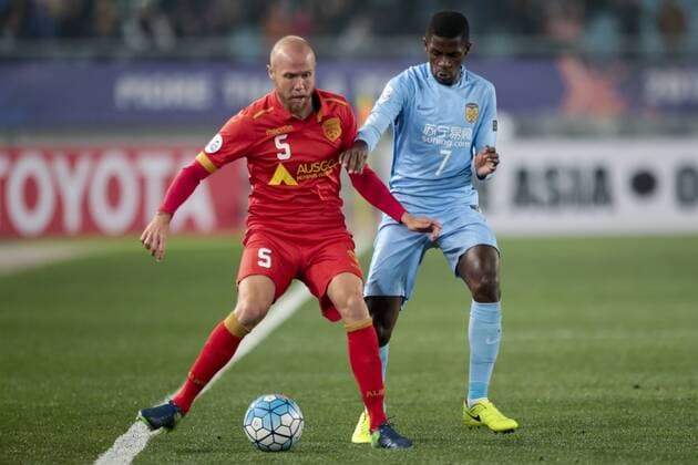 NANJING, CHINA - MARCH 01: Ramires 7 of Jiangsu Suning and Taylor Regan 5 of Adelaide United compete for the ball during the AFC Champions League 2017 Group H match between Jiangsu Suning and Adelaide United at Nanjing Olympic Sports Centre on March 1, 2017 in Nanjing, Jiangsu Province of China.  Copyright: xVCGx CFP500825174 