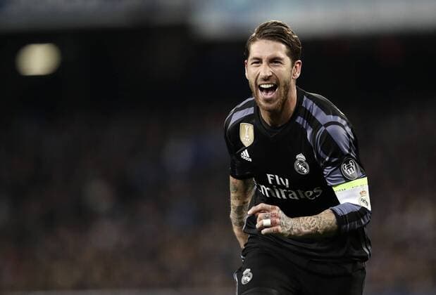 Italy Soccer Champions League: Real Madrid beats Napoli 3-1 Real Madrid Sergio Ramos celebrates after scoring his second goal during the round of 16 second leg soccer match Champions League between Napoli and Real Madrid at the San Paolo stadium. Real Madrid won 3-1 to reach the quarter-finals  IsabellaxBonottox xPacificxPress