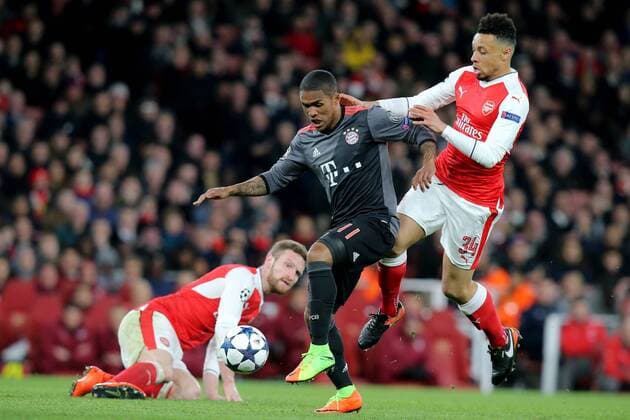 Shkodran Mustafi ( Arsenal FC 20 ) Douglas Costa (FC Bayern Muenchen 11) Francis Coquelin ( Arsenal FC 34 ), Arsenal FC - FC Bayern Muenchen, UEFA Champions League, Achtelfinale, Fussball, 07.03.2017, London Copyright: xLangerx xEibner-Pressefotox EP_HLR