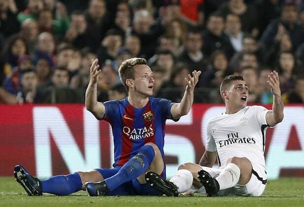 Bilder des Tages - SPORT Paris Saint-Germain s Italian midfielder Marco Verratti (R) and Croatian Ivan Rakitic of FC Barcelona Barca react during the UEFA Champions league second leg round of 16 match between FC Barcelona and Paris Saint-Germain at Camp Nou stadium in Barcelona, Catalonia, Spain, 08 March 2017. FC BARCELONA VS. PARIS SAINT-GERMAIN !ACHTUNG: NUR REDAKTIONELLE NUTZUNG!  Copyright: xAndreuxDalmaux BCN001 20170308-636246058716400962