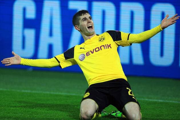 DORTMUND, March 8, 2017 -- Christian Pulisic of Borussia Dortmund celebrates scoring during the UEFA Champions League Round of 16 second leg match between Borussia Dortmund and SL Benfica at Signal Iduna Park in Dortmund, Germany, on March 8, 2017. Borussia Dortmund won 4-0 and advanced to the quarterfinal with 4-1 on aggregate. ) (SP)GERMANY-DORTMUND-SOCCER-UEFA-UCL-DORTMUND VS BENFICA LuoxHuanhuan 