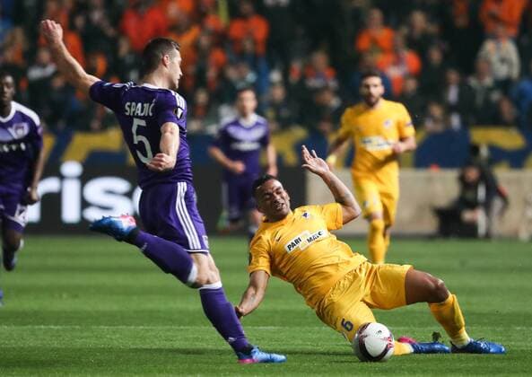 Anderlecht s Uros Spajic and Apoel s Lorenzo Ebecilio fight for the ball during a soccer game between Cypriot club APOEL FC and Belgian team RSC Anderlecht in Nicosia, Cyprus, Thursday 09 March 2017, the first leg of the 1 8 finals of the Europa League competition. VIRGINIExLEFOUR  x05061808x