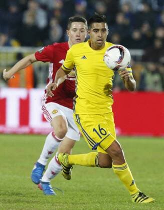 ROSTOV-ON-DON, RUSSIA - MARCH 9, 2017: FC Manchester United ManU s Ander Herrera (L) and FC Rostov s Christian Noboa fight for the ball in Leg 1 of their 2016-17 UEFA Europa League Round of 16 football match at Olimp-2 Stadium. The game ended in a 1-1 draw. Valery Matytsin TASS  TS043C50