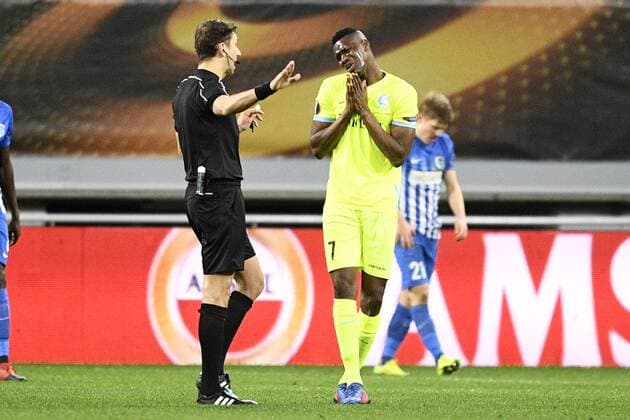 Italian referee Paolo Tagliavento and Gent s Kalifa Coulibaly pictured during a soccer game between Belgian teams KAA Gent and KRC Genk, Thursday 09 March 2017 in Gent, the first leg of the 1 8 finals of the Europa League competition. YORICKxJANSENS  x05062045x