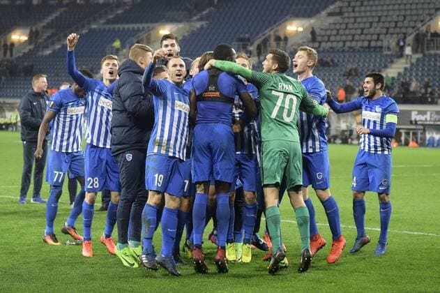 Genk s players celebrate after winning a soccer game between Belgian teams KAA Gent and KRC Genk, Thursday 09 March 2017 in Gent, the first leg of the 1 8 finals of the Europa League competition. YORICKxJANSENS  x05062100x